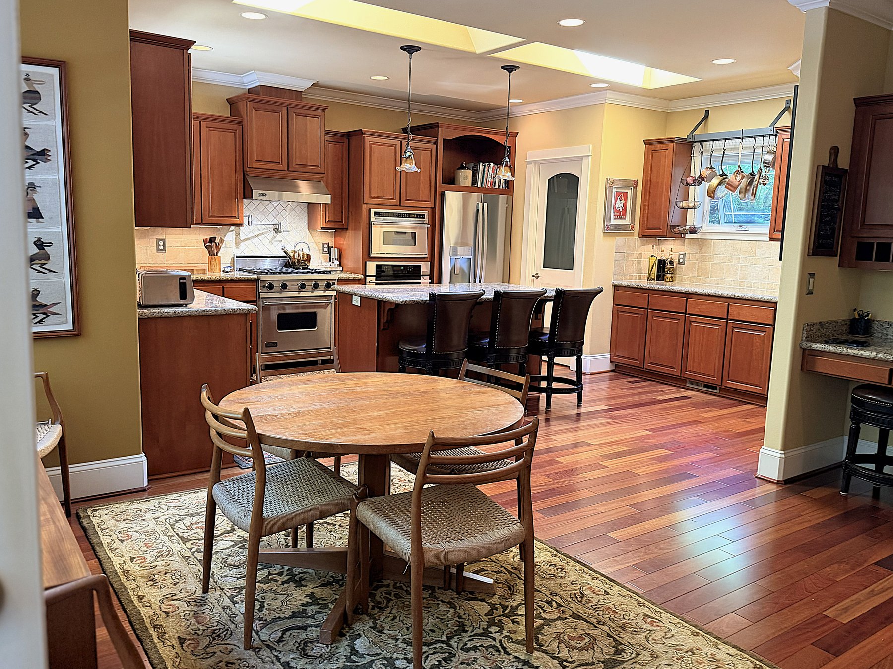 Chef's kitchen with Viking range and cherry cabinetry